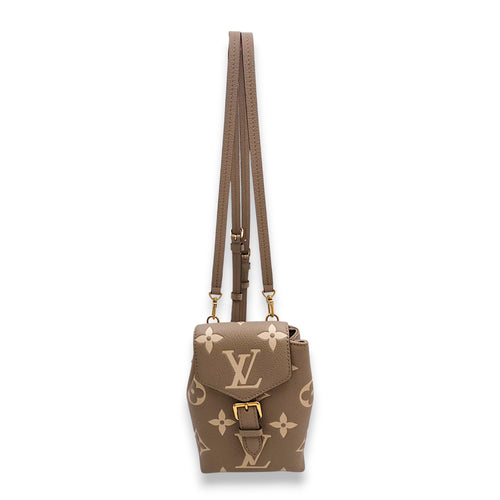 Tiny Backpack in Giant Monogram  Beige Backpack in Empreinte Leather Gold hardware