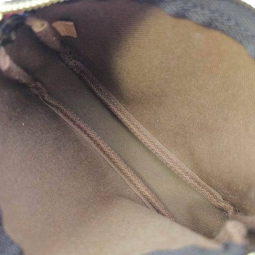 Limited Edition Pochette “Evasion” Christmas Animation Mini Brown Coin Purse in Canvas Gold hardware CL2606-21759 6