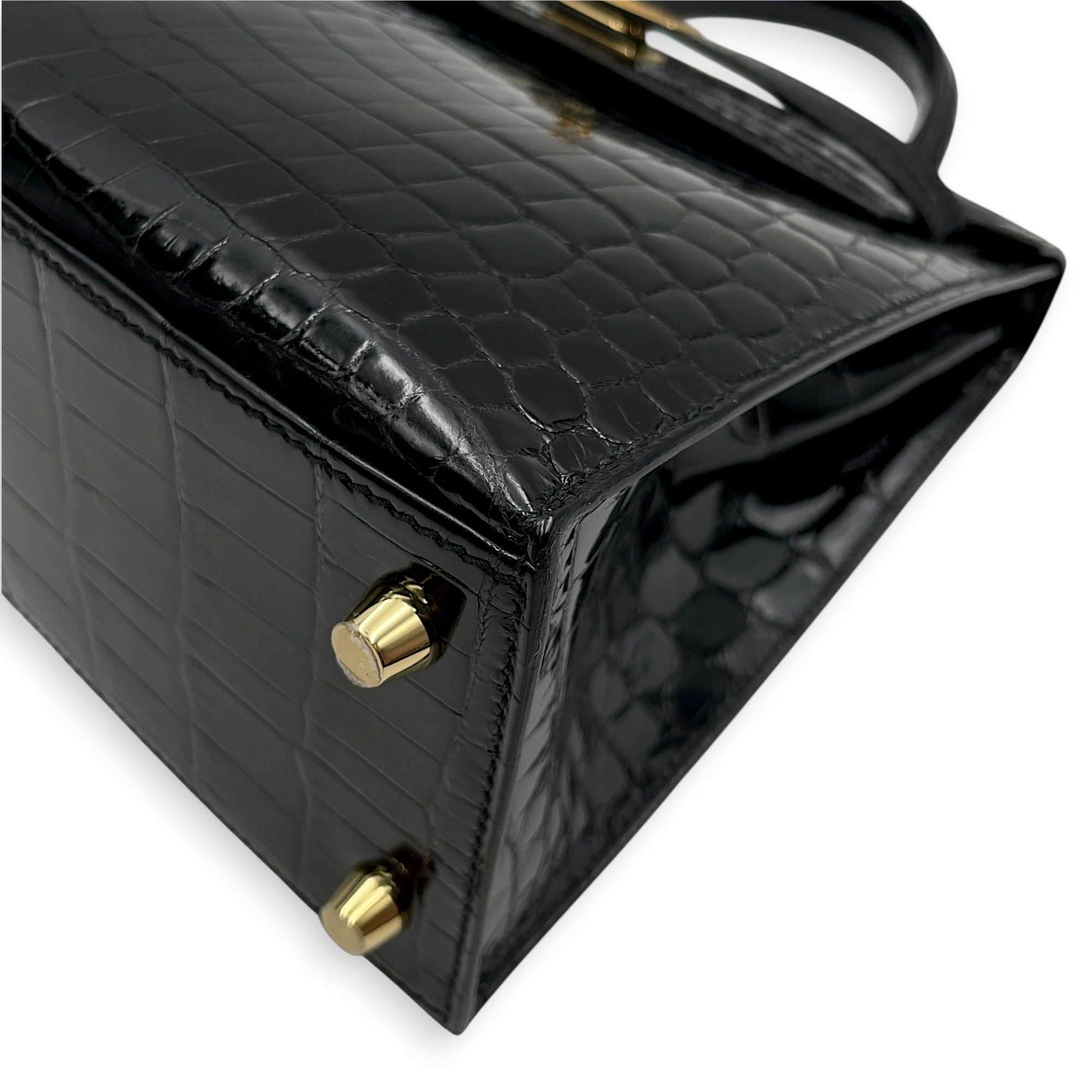 Sellier Kelly 25 Noir in Shiny Niloticus Gold hardware