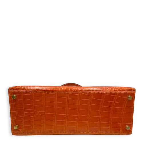 Sellier Kelly 28 Orange in Shiny Niloticus Gold hardware