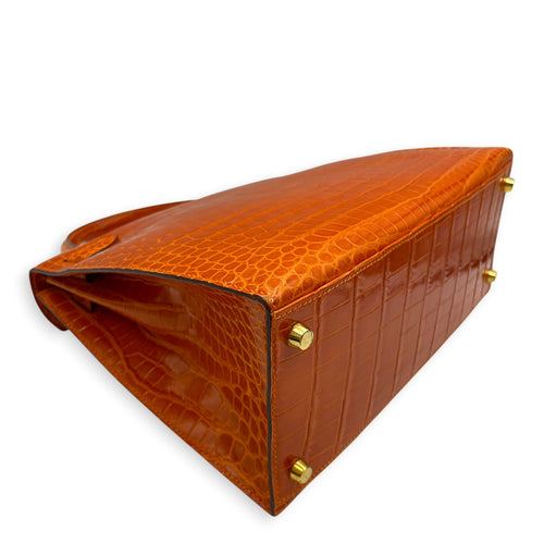 Sellier Kelly 28 Orange in Shiny Niloticus Gold hardware