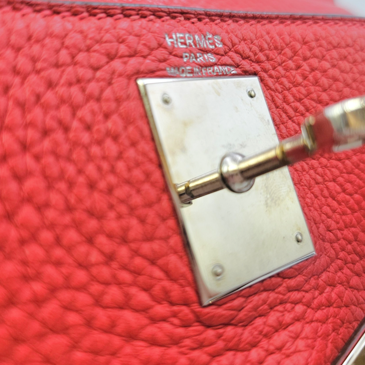 Kelly 28 Rouge Casaque in Clemence Palladium hardware