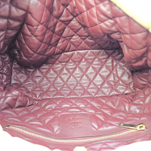 Coco Cocoon Reversible  Burgundy and Gold Top Handle Bag in Lambskin Gold hardware
