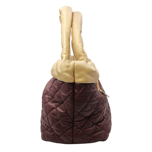 Coco Cocoon Reversible  Burgundy and Gold Top Handle Bag in Lambskin Gold hardware
