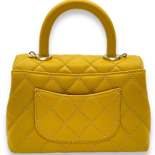 Coco Mini Mustard Yellow Top Handle Bag in Caviar Leather, Gold hardware