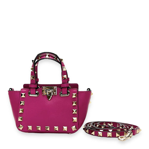 Rockstud Micro Pink Top Handle Bag in Calfskin, Gold hardware