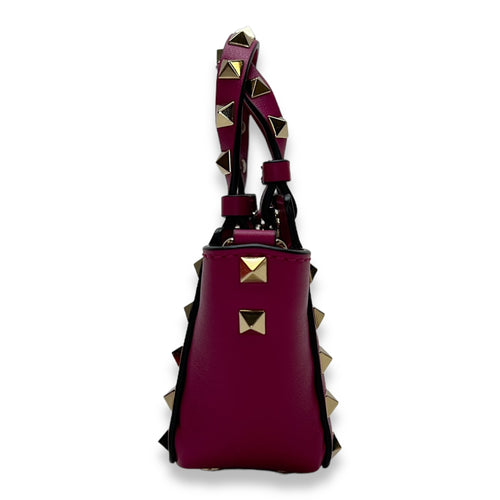 Rockstud Micro Pink Top Handle Bag in Calfskin, Gold hardware