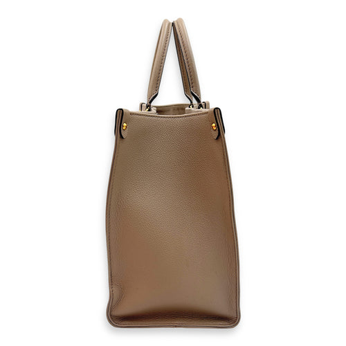 Louis Vuitton OnTheGo MM Beige Top Handle Bag in Empreinte Leather, Gold hardware_3