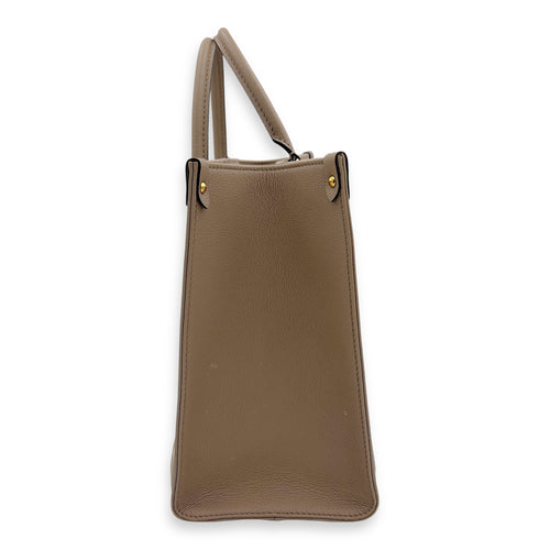 Louis Vuitton OnTheGo MM Beige Top Handle Bag in Empreinte Leather, Gold hardware_3