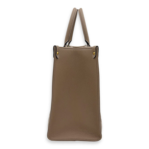 Louis Vuitton OnTheGo MM Beige Top Handle Bag in Empreinte Leather, Gold hardware_4