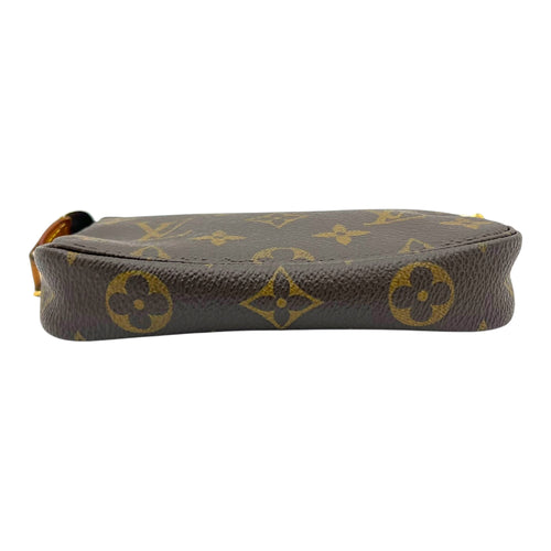 Pochette Accessoires Mini Brown Pouch in Monogram Coated Canvas, Gold hardware