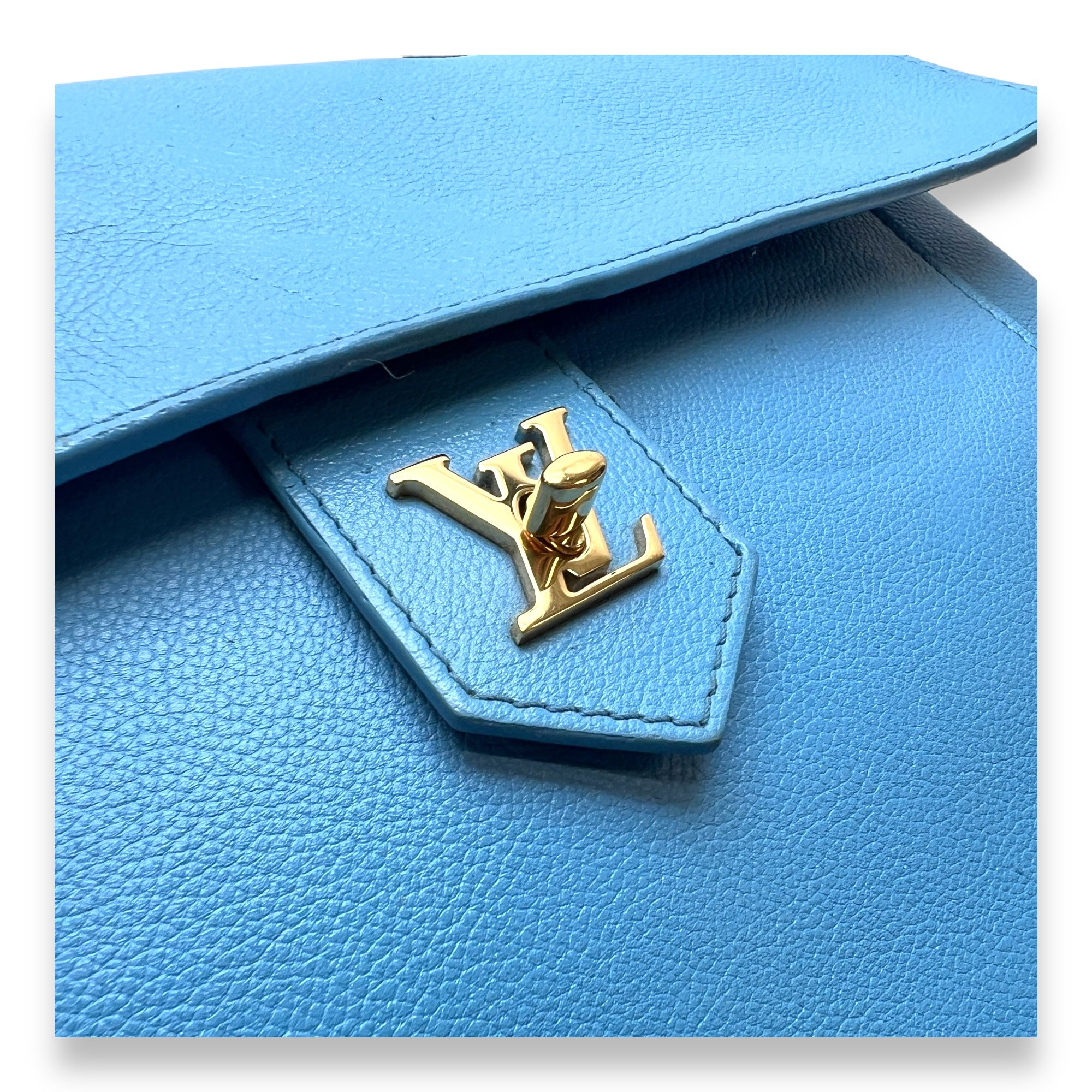 LockMe MM Blue Top Handle Bag in Calfskin, Gold hardware