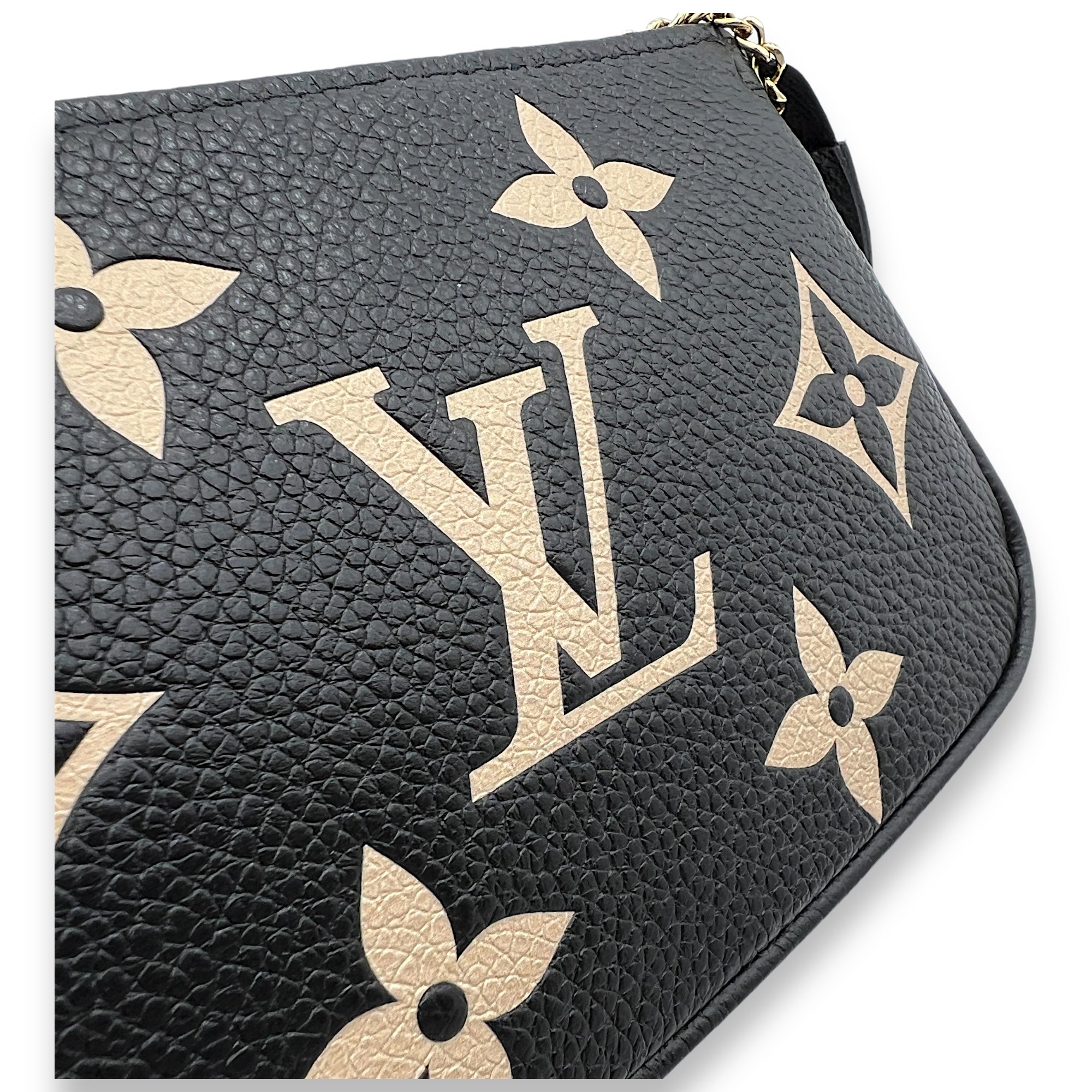 Pochette Mini Black Pouch in Monogram Empreinte Leather, Gold hardware