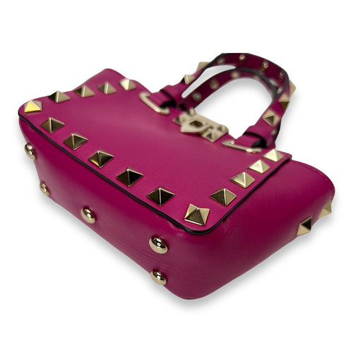 Rockstud Micro Pink Top Handle Bag in Calfskin, Gold hardware