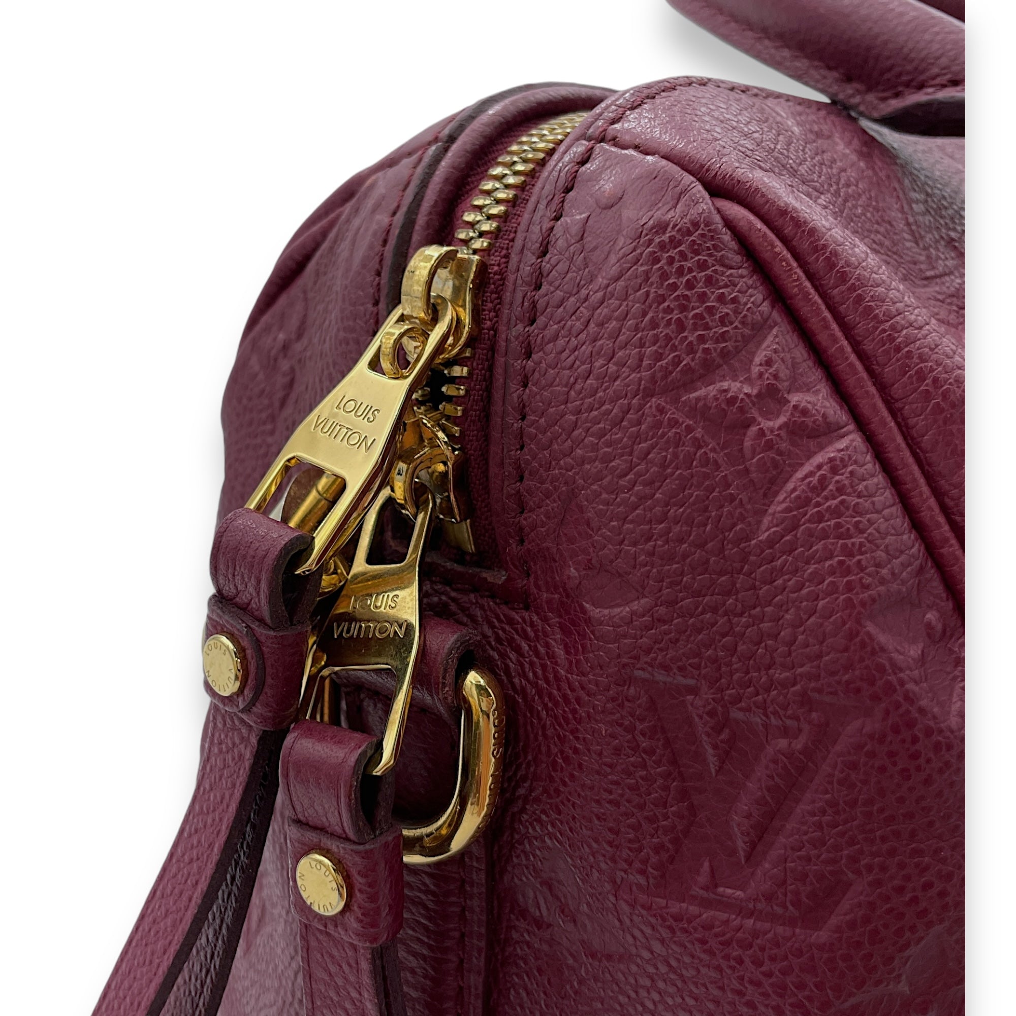 Speedy Bandouliere 25 Red Top Handle Bag in Monogram Empreinte Leather, Gold hardware