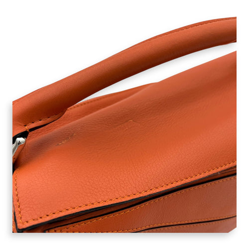 Puzzle Medium Orange Top Handle Bag in Calfskin, Silver hardware