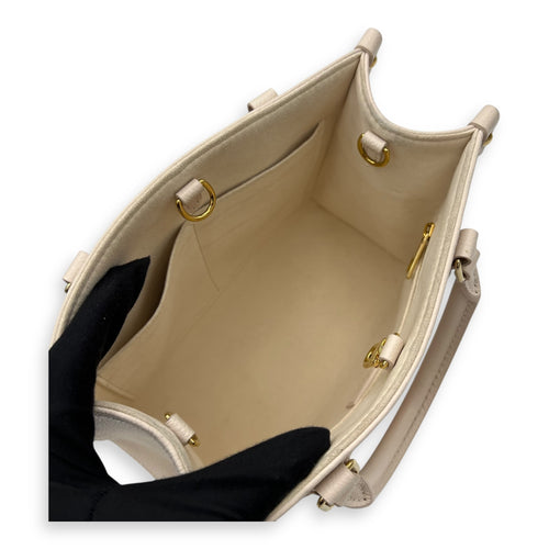 Louis Vuitton OnTheGo Top Handle Bag PM Beige in Empreinte Leather, Gold hardware_10