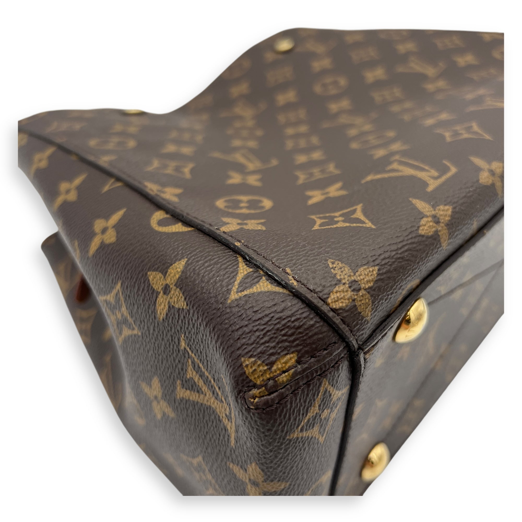 Montaigne Top Handle Bag Brown in Monogram Coated Canvas, Gold hardware