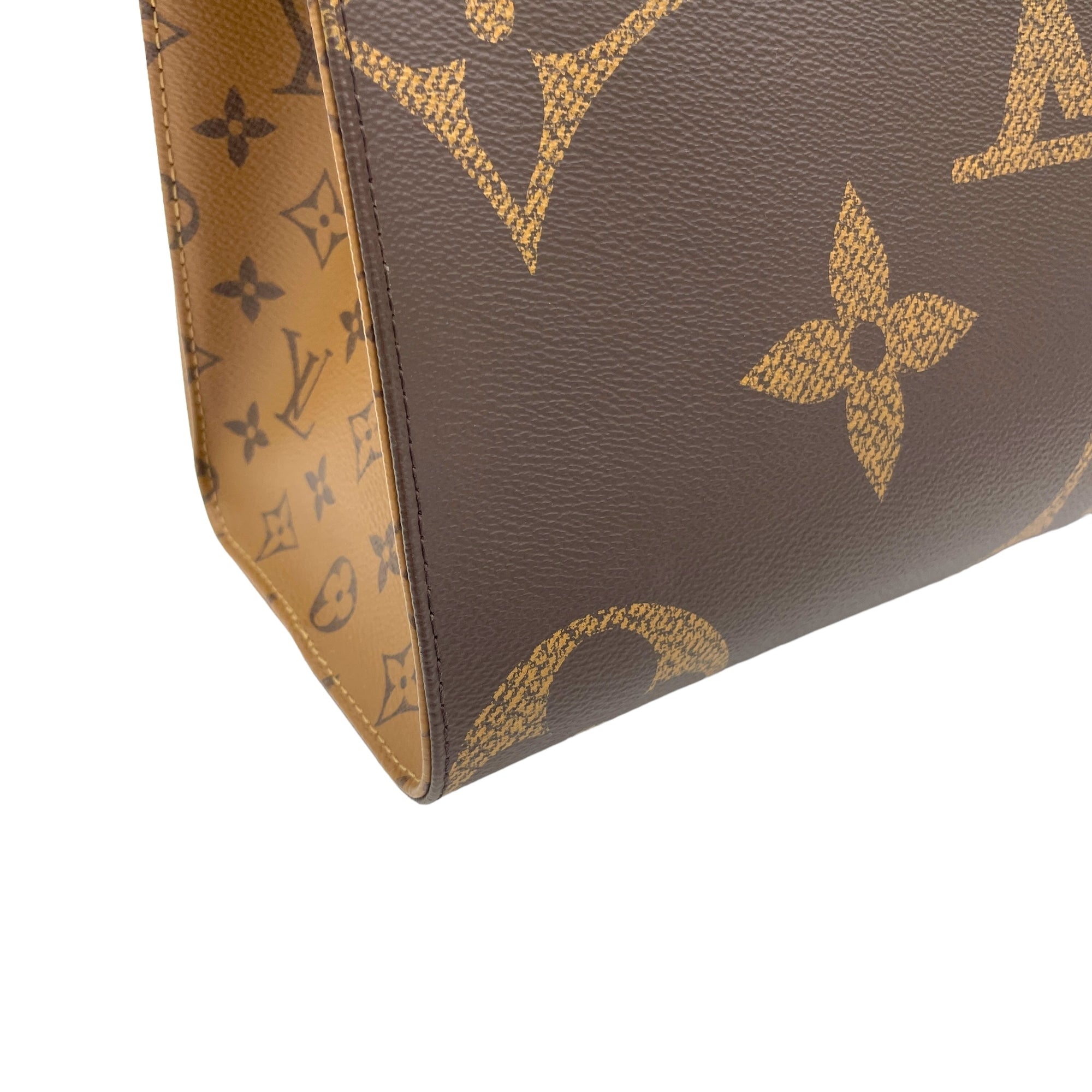 OnTheGo MM Brown Tote Bag in Monogram Coated Canvas, Gold hardware