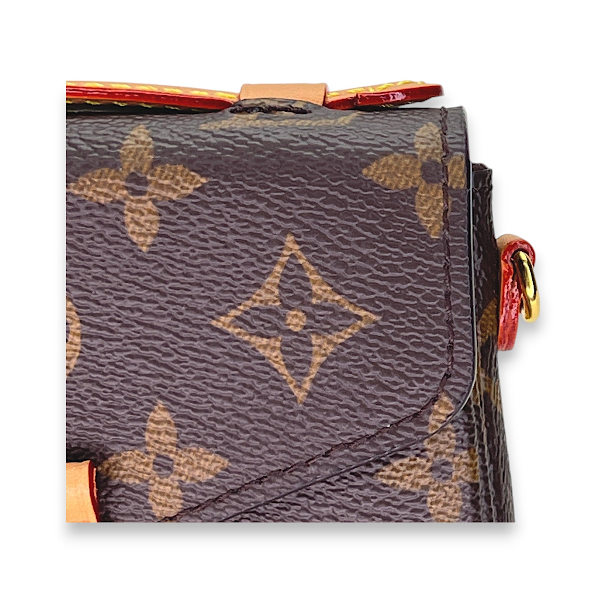 Metis Micro Coin purse in Monogram coated canvas, Gold Hardware