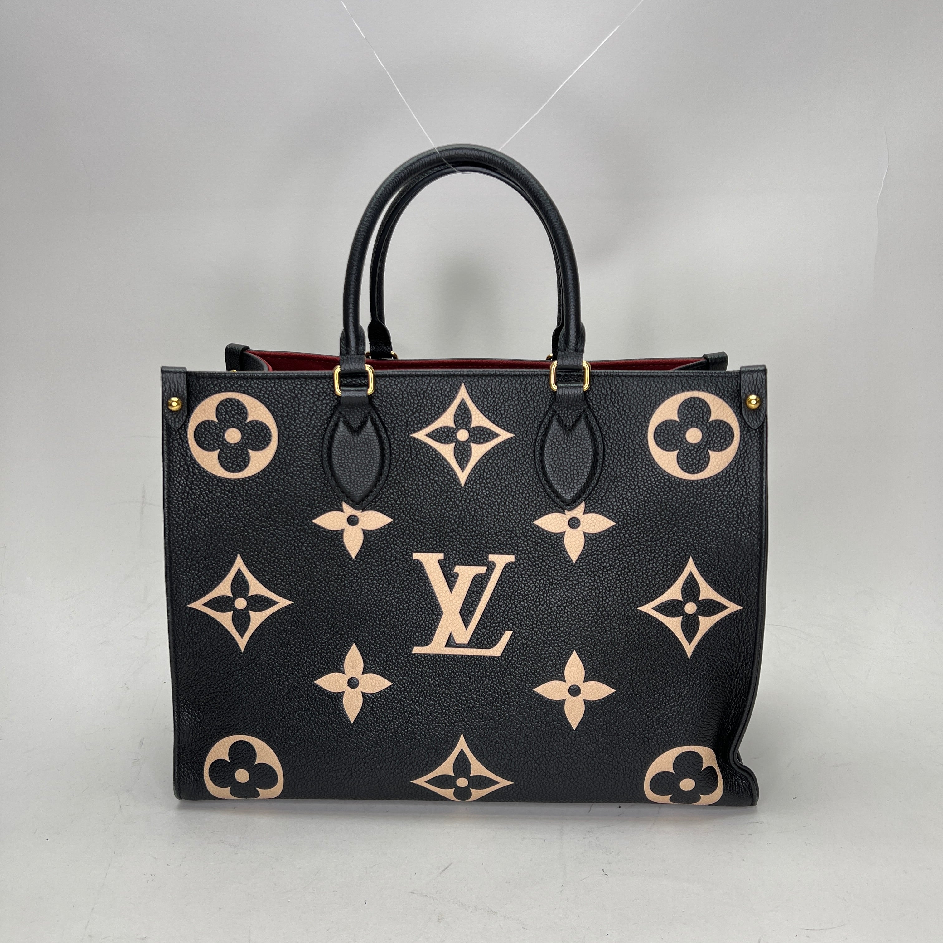 Louis vuitton on the go tote bag best sale