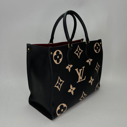 OnTheGo MM Black Tote Bag in Monogram Empreinte Leather, Gold hardware