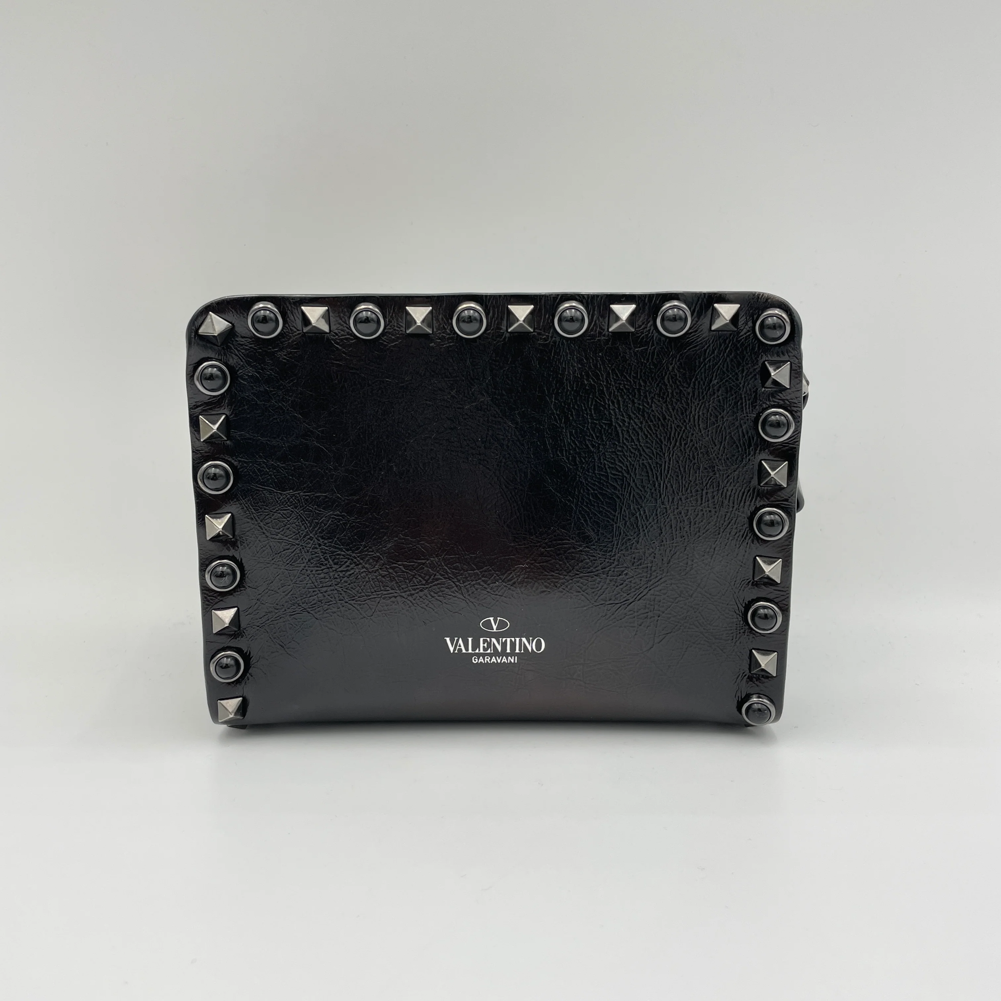 Rolling Rockstud Black Crossbody Bag in Calfskin, Gunmetal hardware