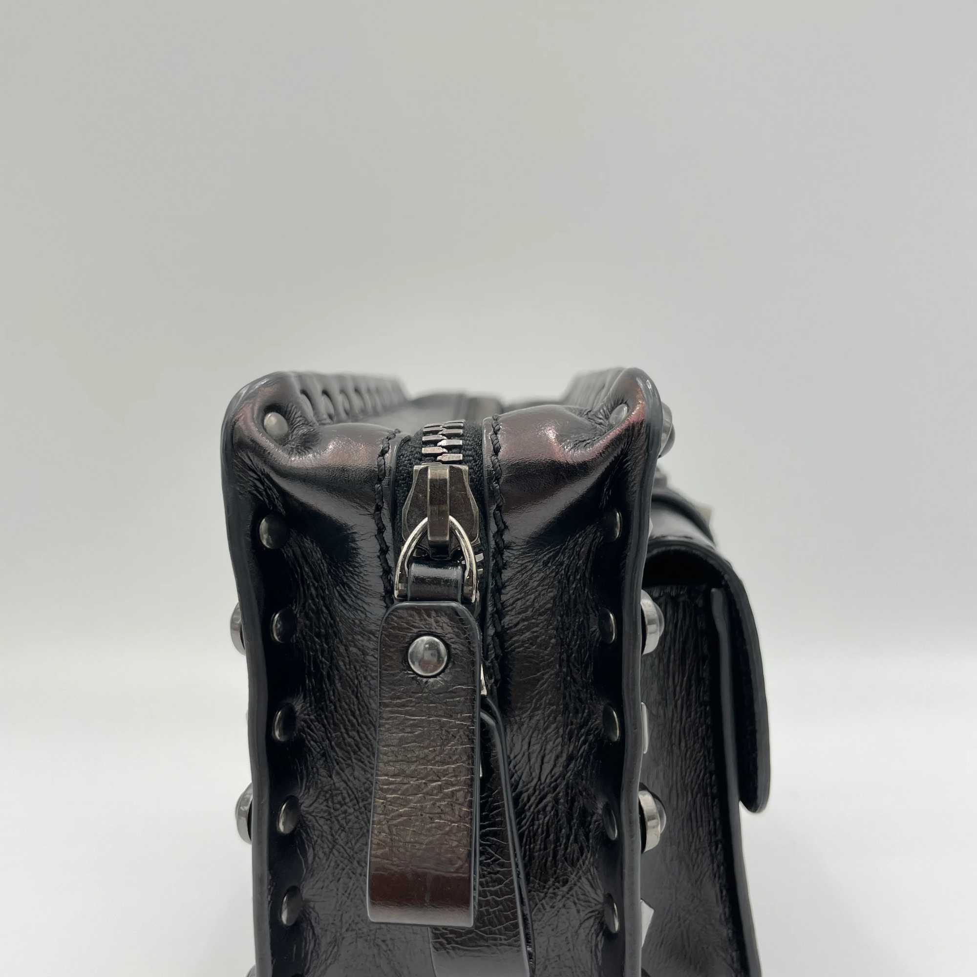 Rolling Rockstud Black Crossbody Bag in Calfskin, Gunmetal hardware