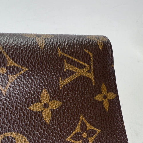 Bi Fold Brown Passport Holder in Monogram Coated Canvas