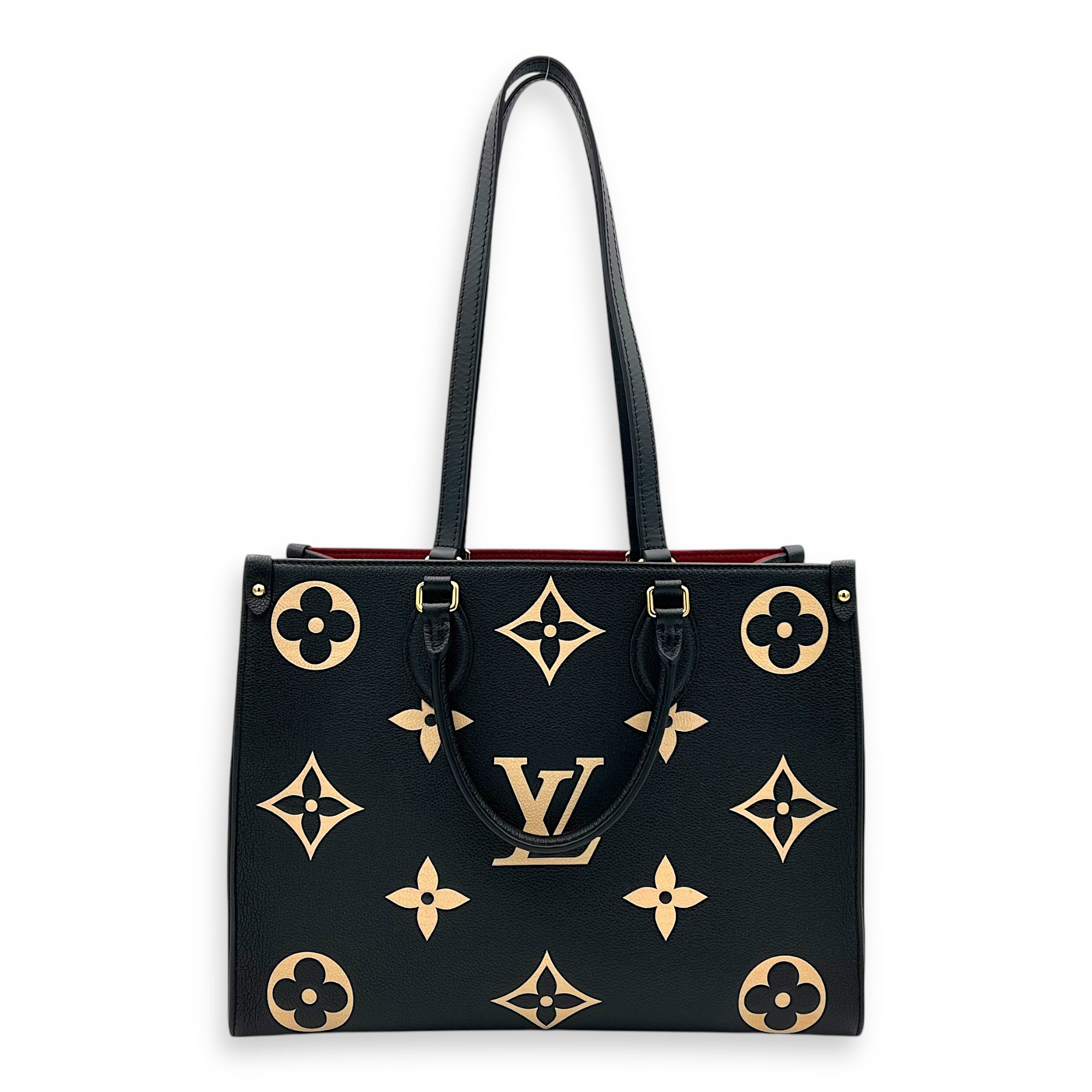 OnTheGo MM Blue Top Handle Bag in Empreinte Leather, Gold hardware
