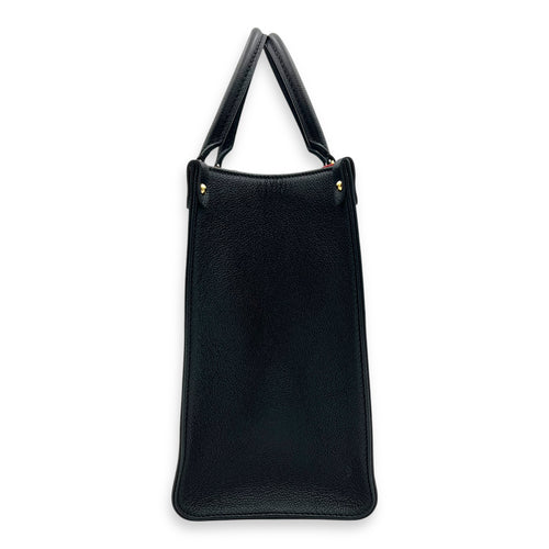OnTheGo MM Blue Top Handle Bag in Empreinte Leather, Gold hardware
