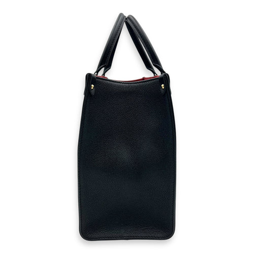 OnTheGo MM Blue Top Handle Bag in Empreinte Leather, Gold hardware