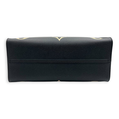OnTheGo MM Blue Top Handle Bag in Empreinte Leather, Gold hardware