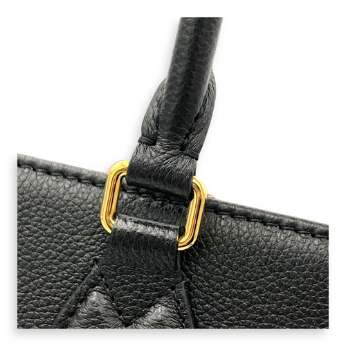OnTheGo MM Blue Top Handle Bag in Empreinte Leather, Gold hardware