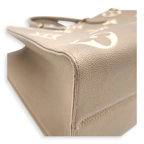 OnTheGo Top Handle Bag MM Beige in Empreinte Leather, Gold hardware