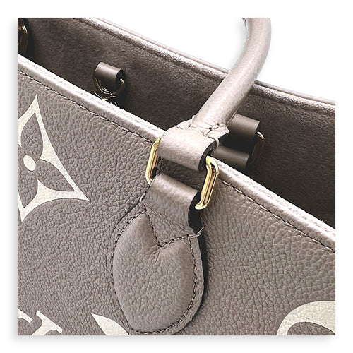 OnTheGo Top Handle Bag MM Beige in Empreinte Leather, Gold hardware