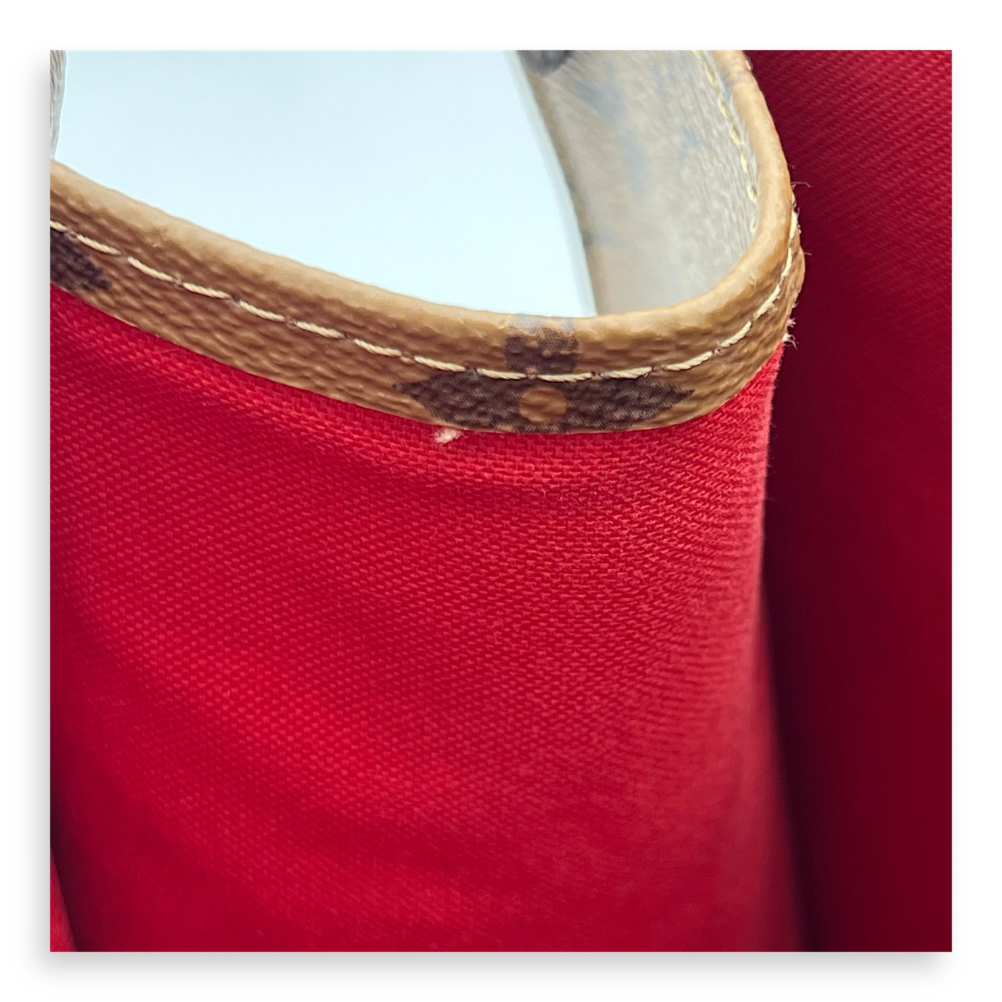 OnTheGo MM Brown Top Handle Bag in Monogram Coated Canvas, Gold hardware