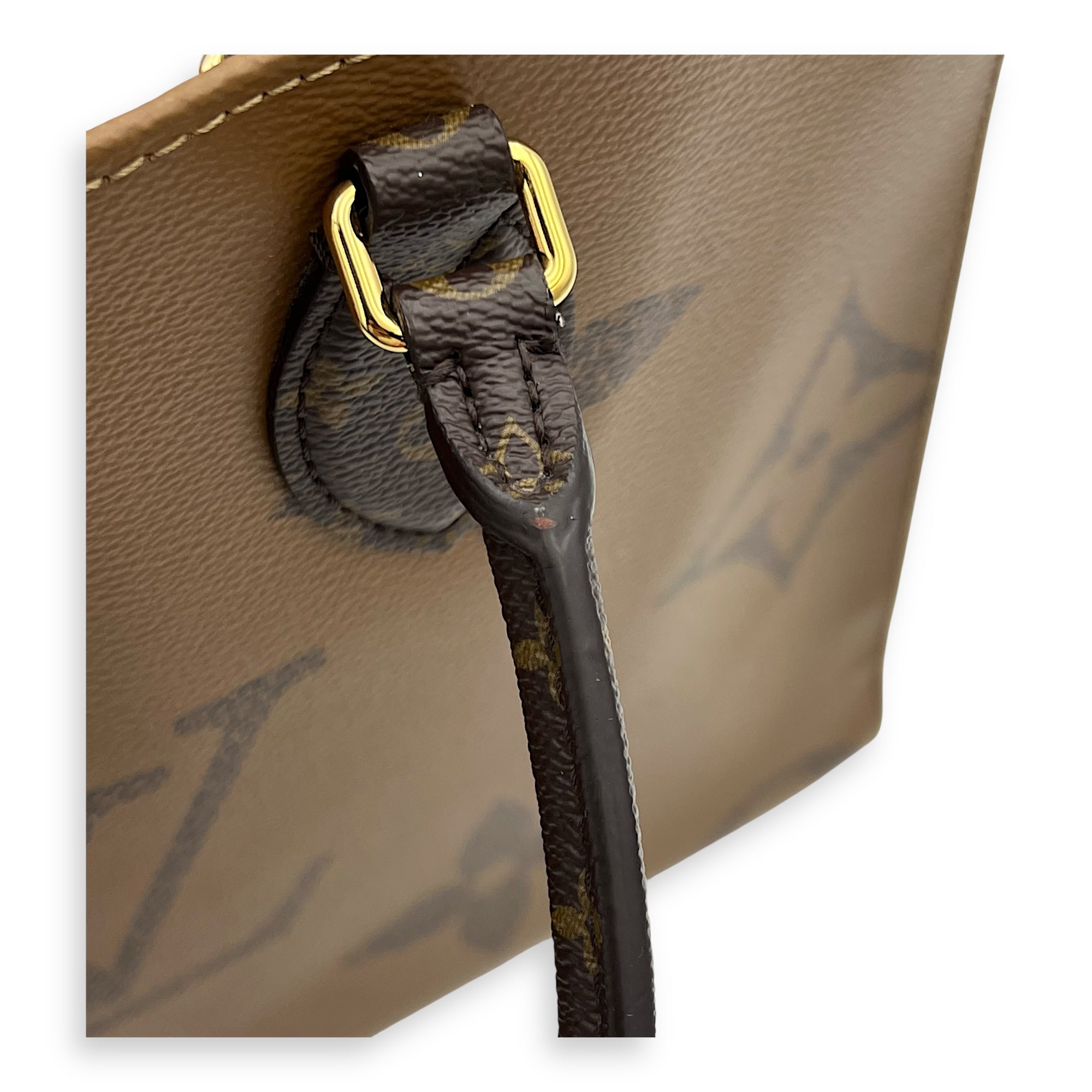 OnTheGo MM Brown Top Handle Bag in Monogram Coated Canvas, Gold hardware