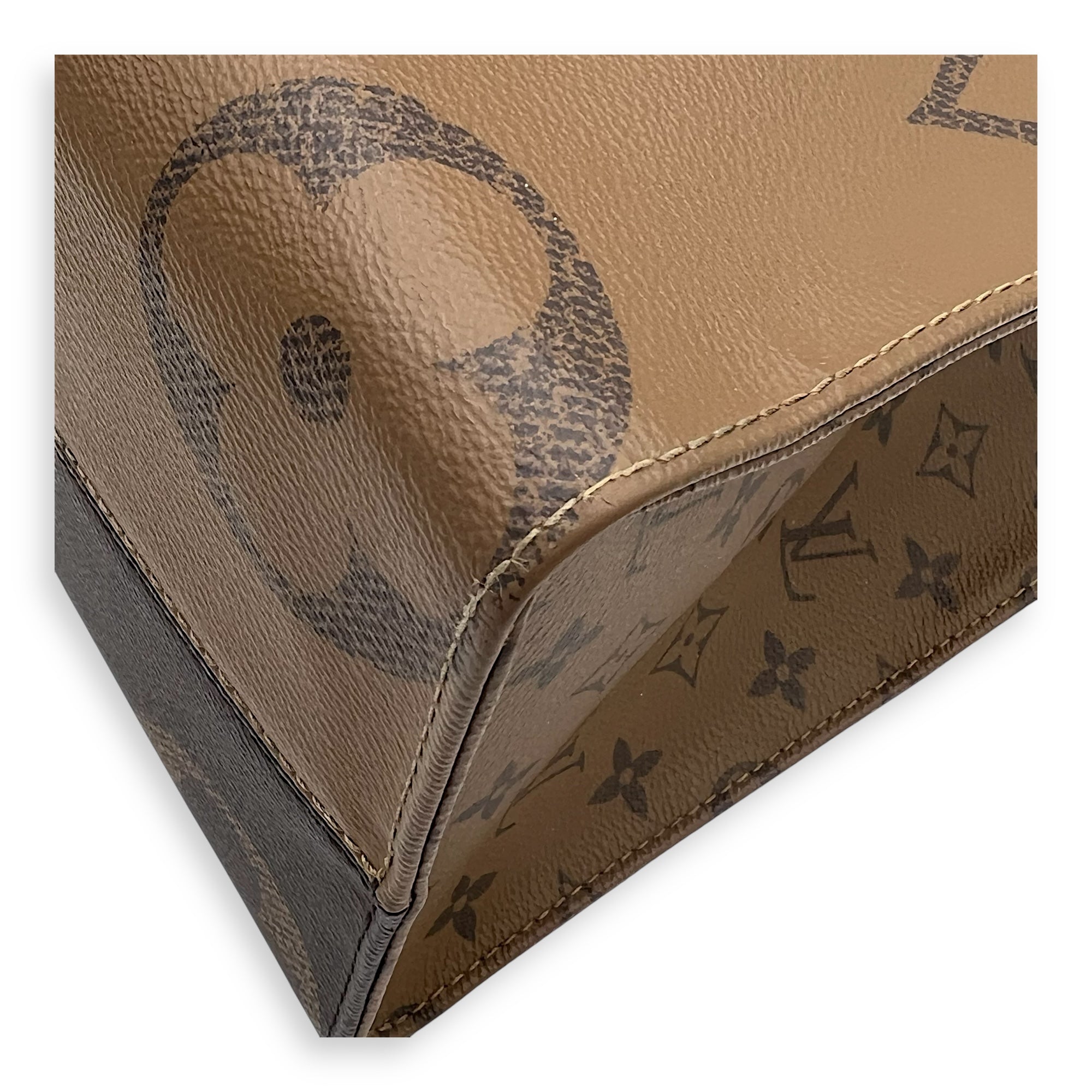 OnTheGo MM Brown Top Handle Bag in Monogram Coated Canvas, Gold hardware