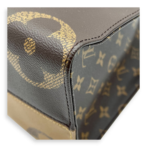 OnTheGo MM Brown Top Handle Bag in Monogram Coated Canvas, Gold hardware