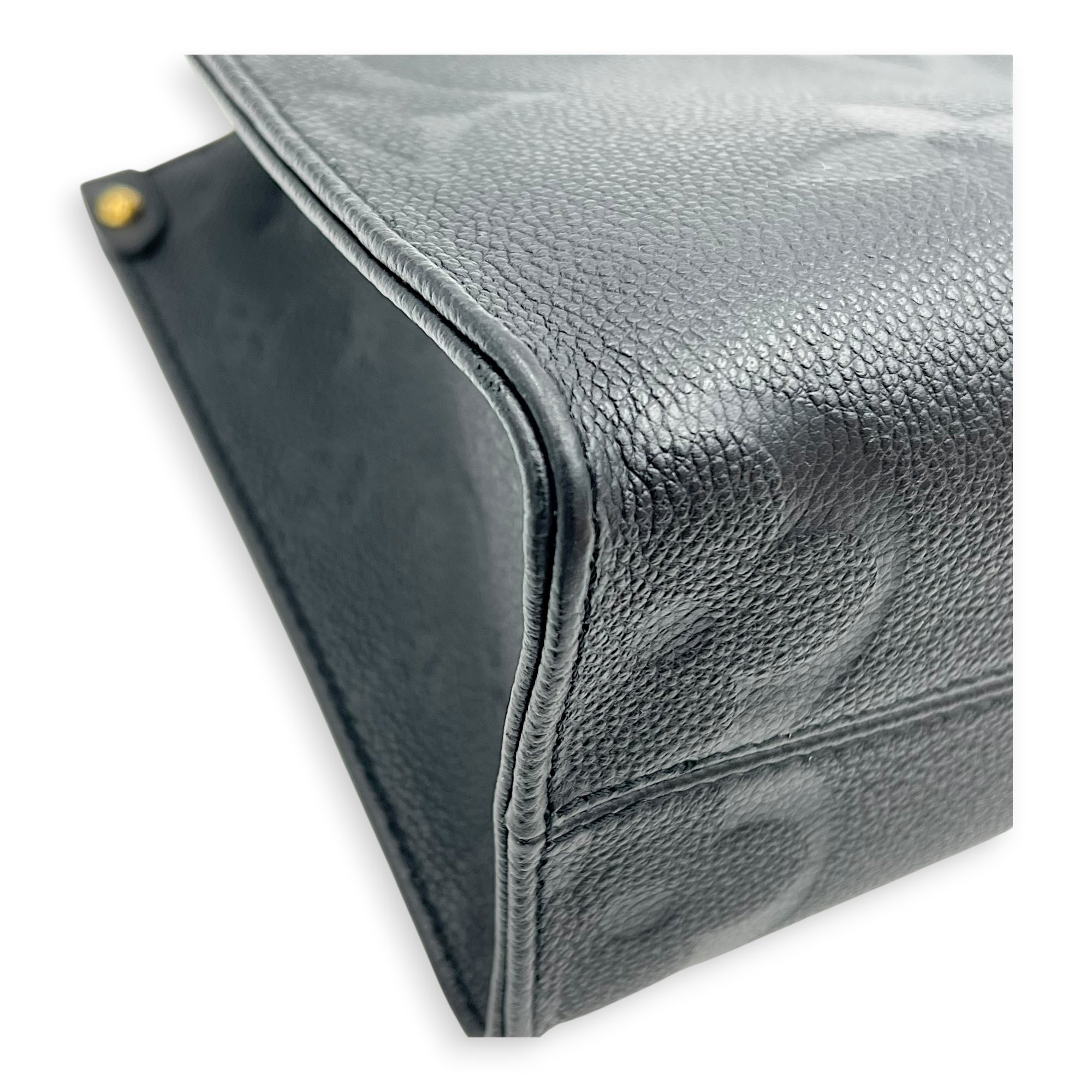 OnTheGo Top Handle Bag PM Black in Empreinte Leather, Gold hardware