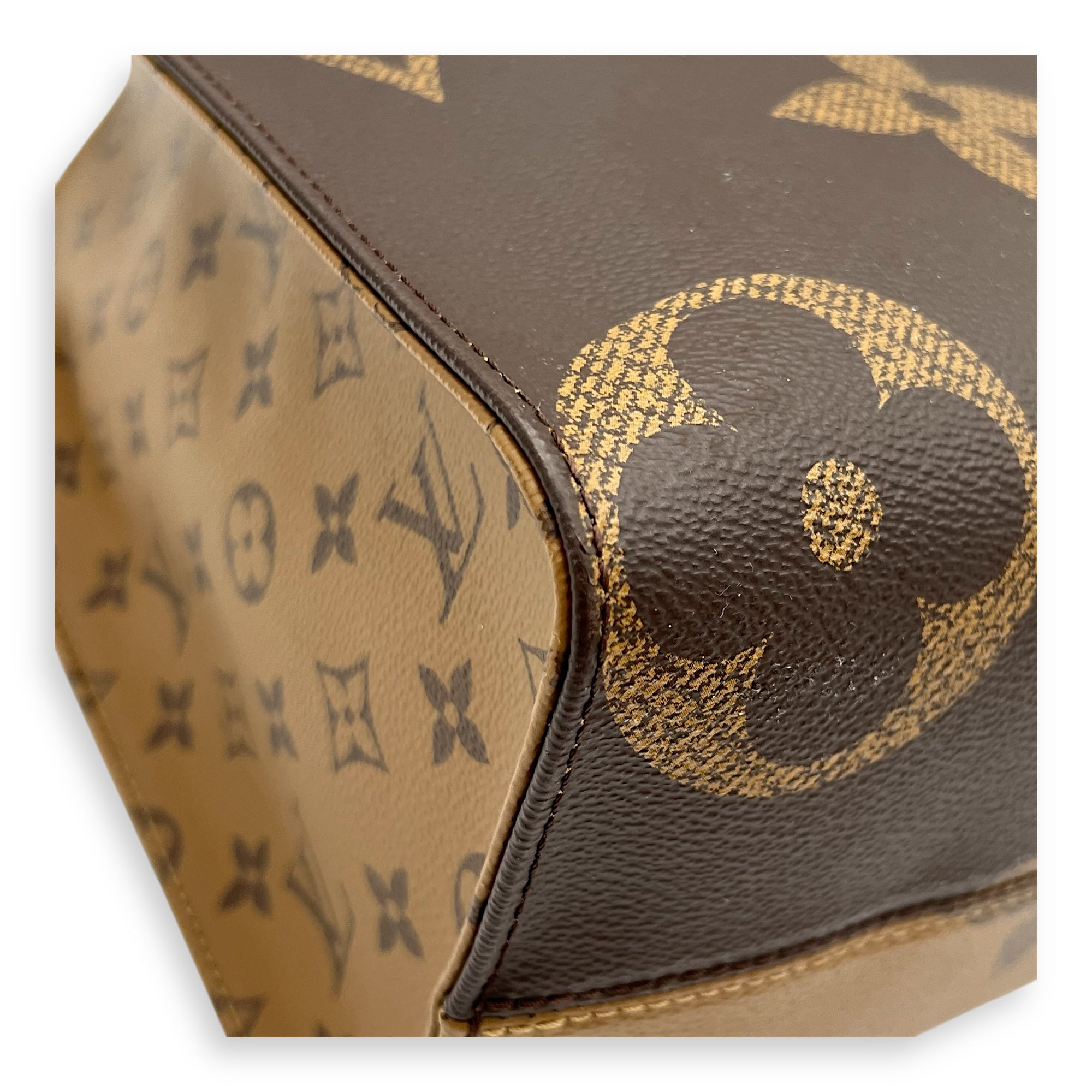 OnTheGo MM Brown Tote Bag in Monogram Coated Canvas, Gold hardware