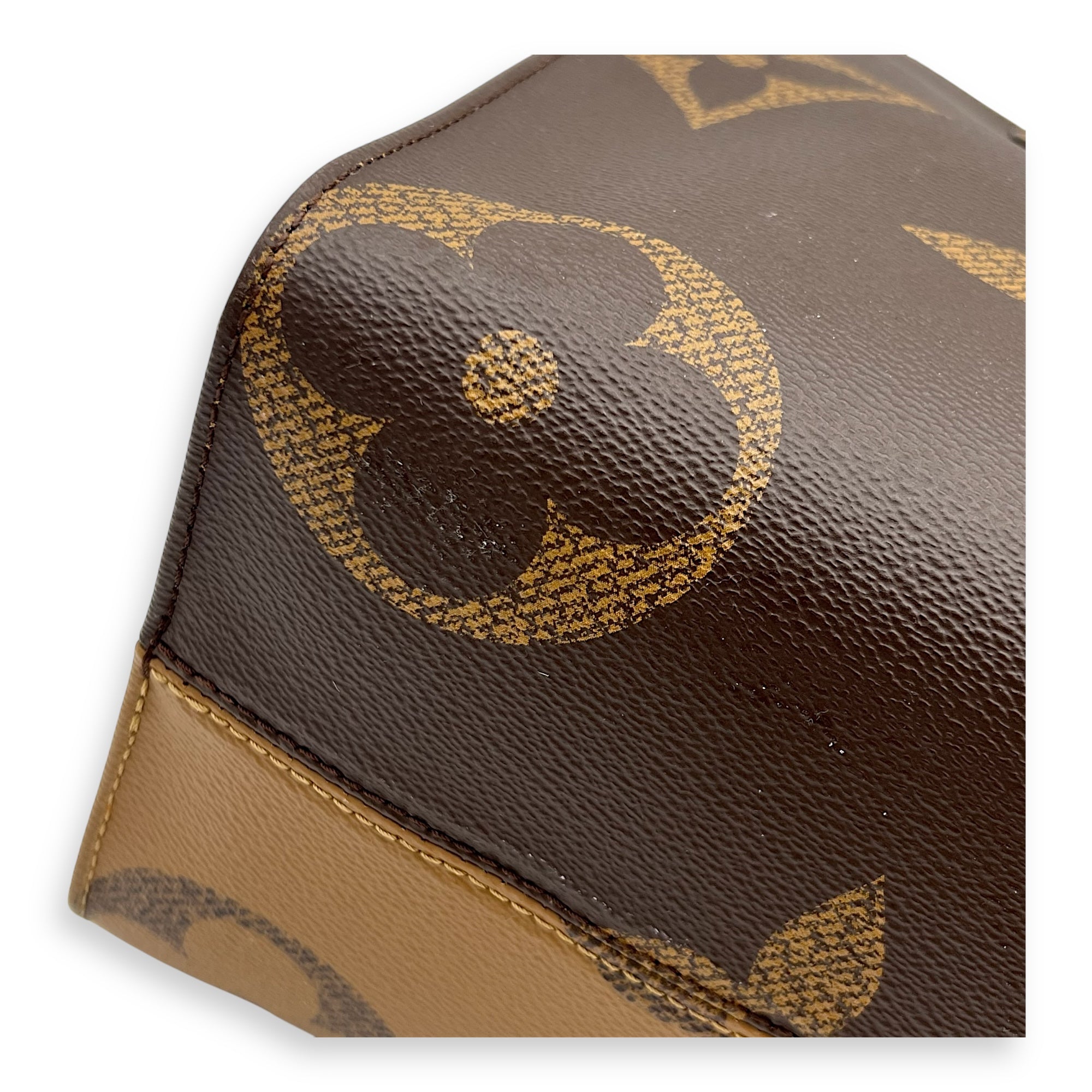 OnTheGo MM Brown Tote Bag in Monogram Coated Canvas, Gold hardware