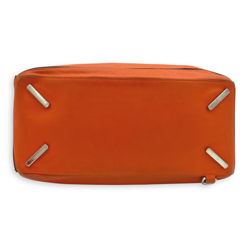 Puzzle Top Handle Bag Medium Orange in Calfskin, Silver hardware
