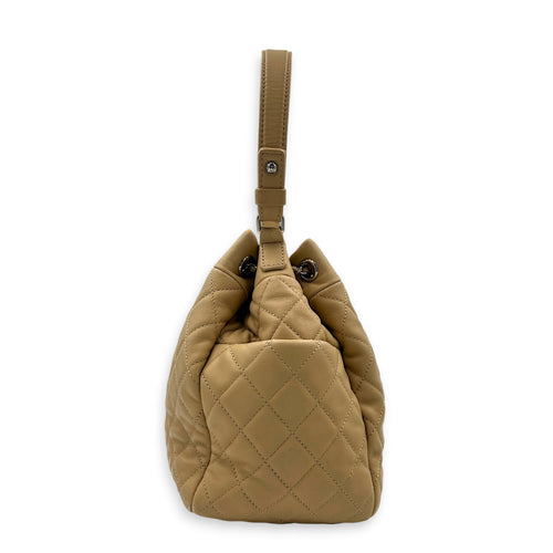 Drawstring CC Beige Bucket Bag in Lambskin, Silver hardware