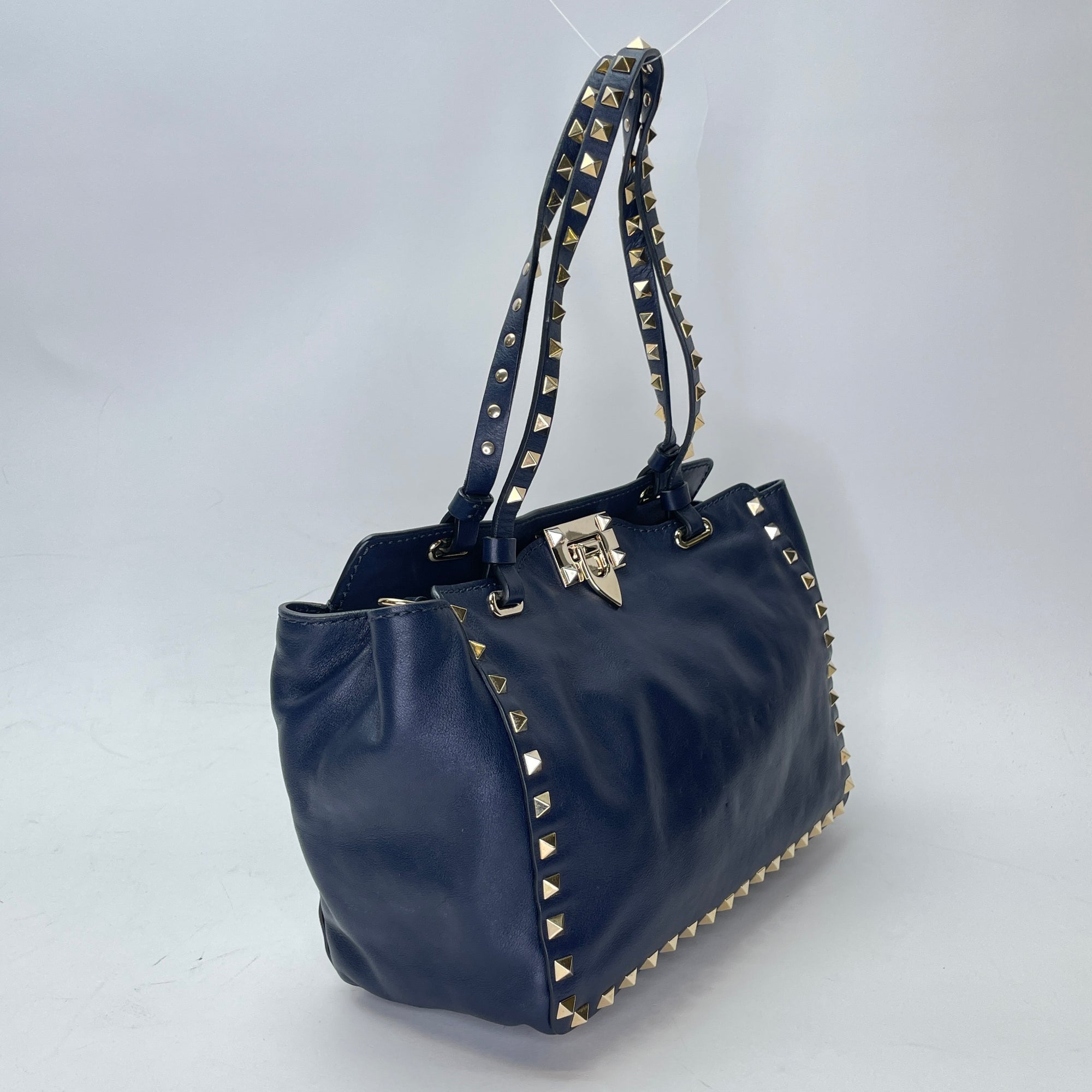 Rockstud Navy Top Handle Bag in Calfskin, Gold hardware