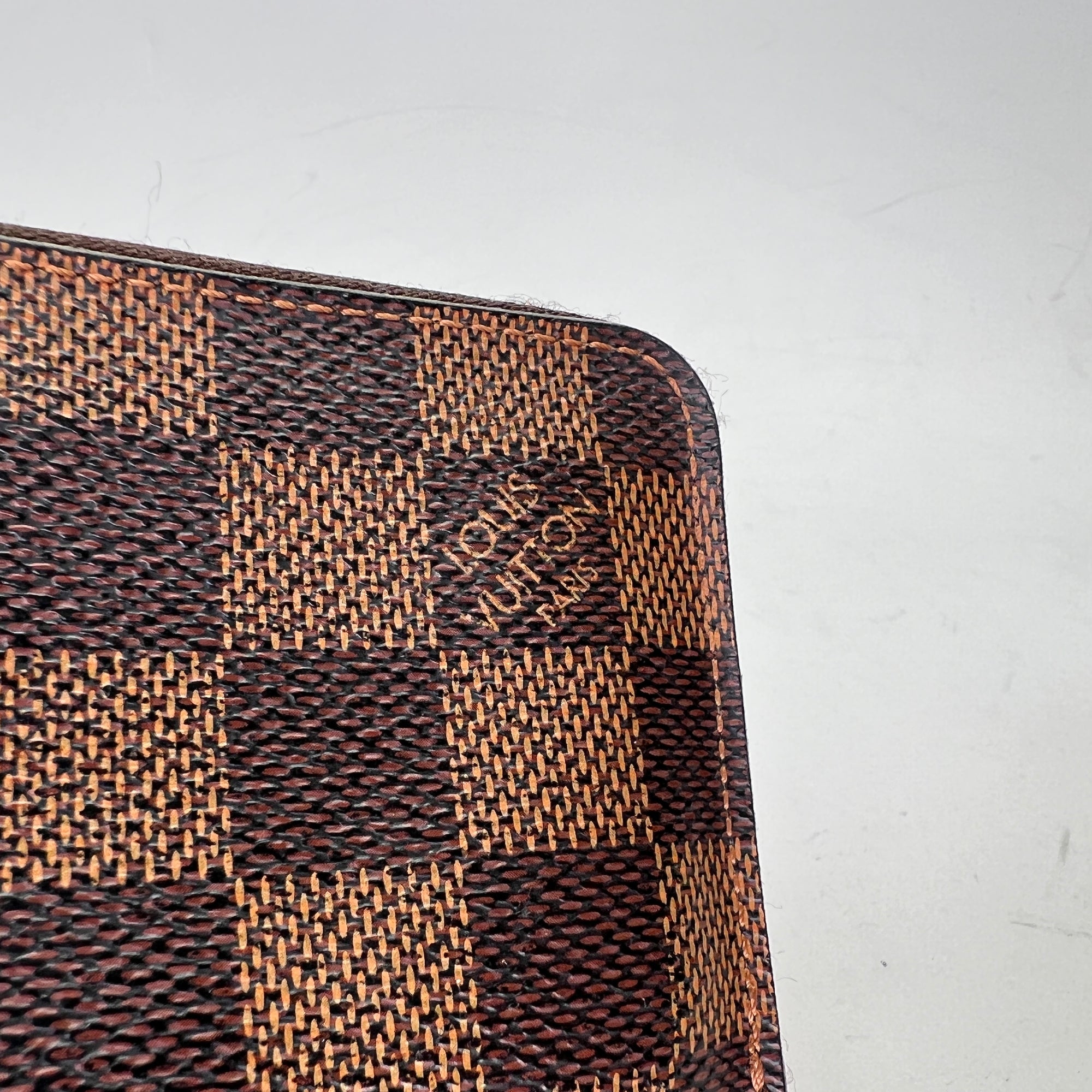 Damier Ebene Zip Brown Wallet in Coated Canvas, Gold hardware