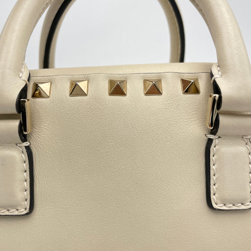 Rockstud Cream Top Handle Bag in Calfskin, Gold hardware