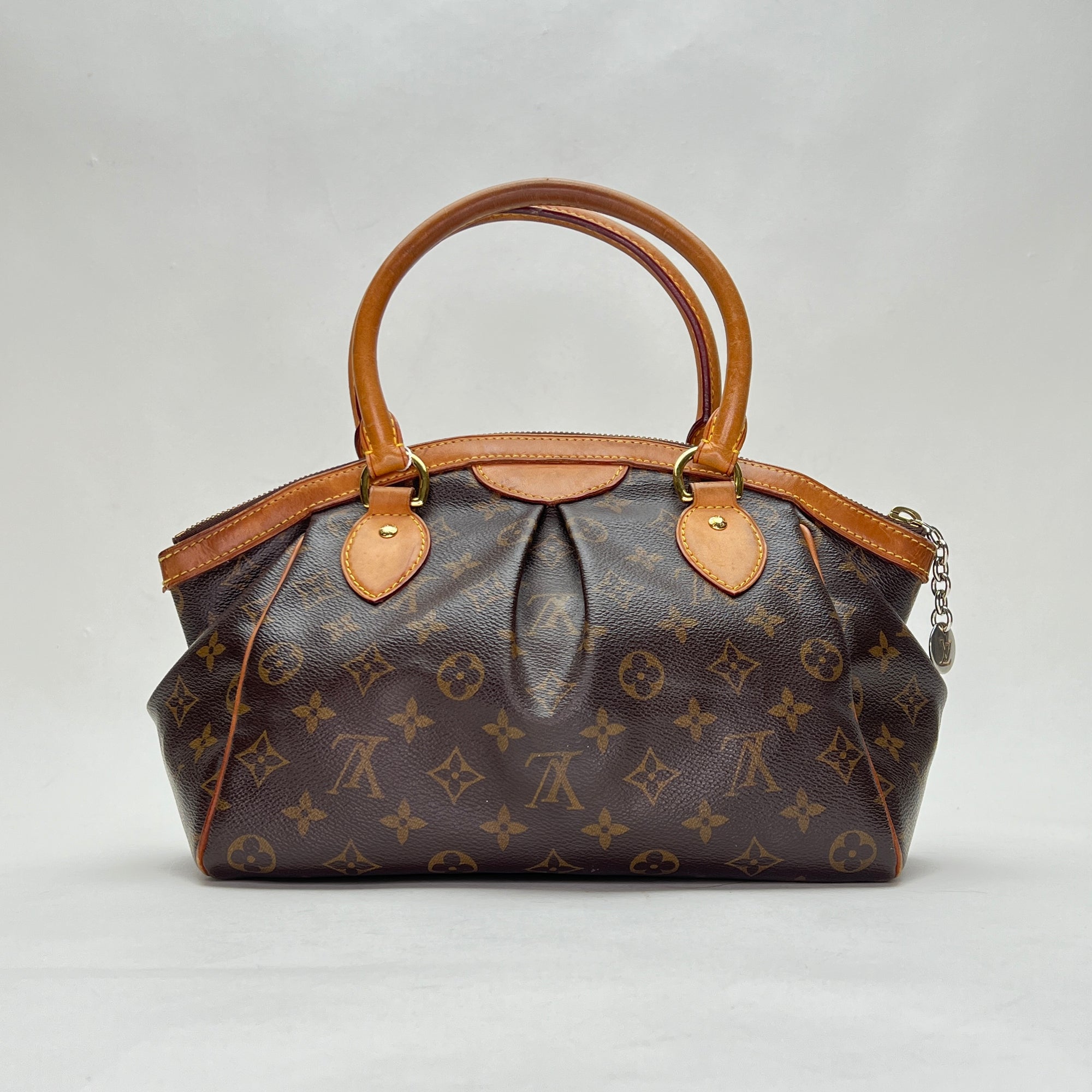 Tivoli PM Brown Top Handle Bag in Monogram Coated Canvas, Gold hardware