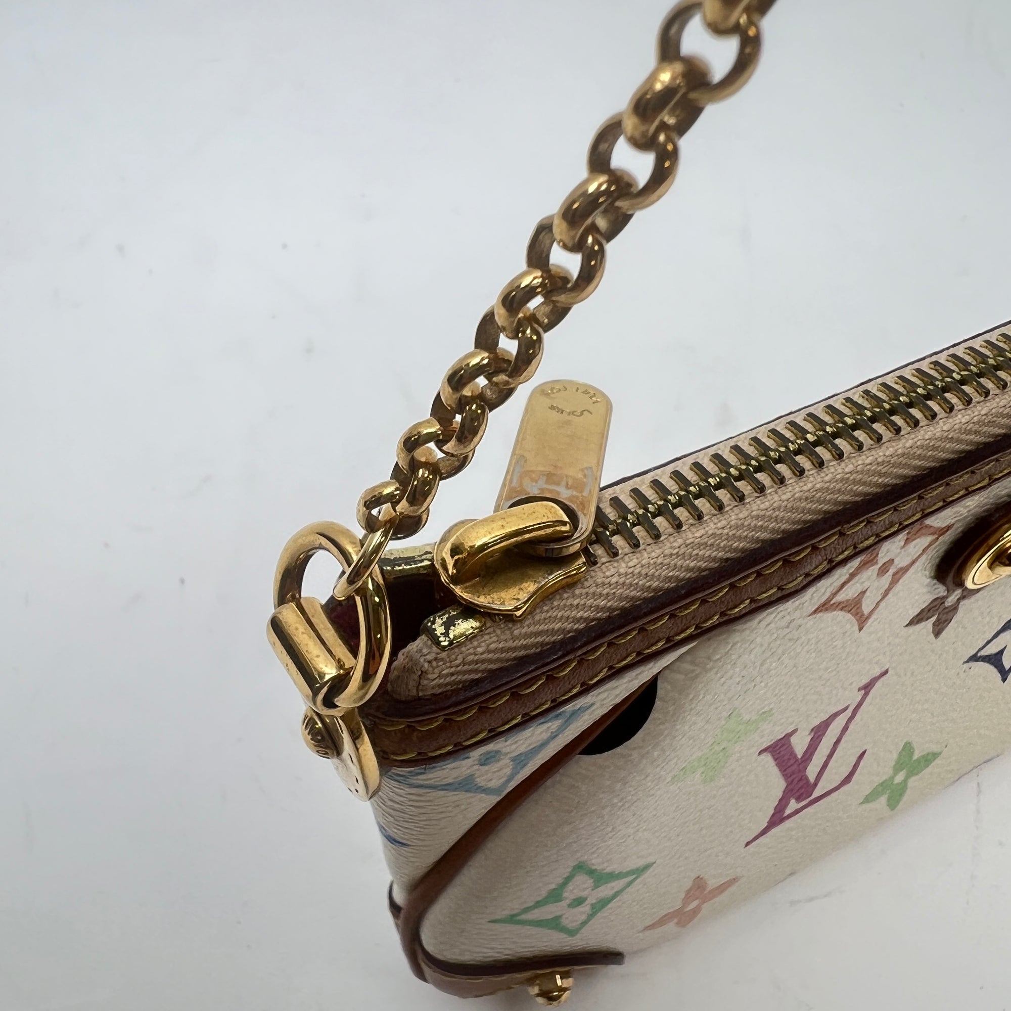 Milla Pochette MM White Shoulder Bag in Monogram Coated Canvas, Gold hardware